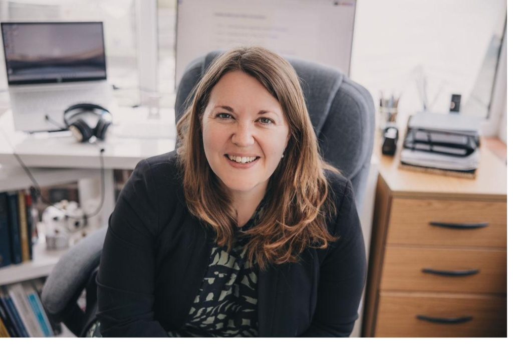 Emma Evans at her desk